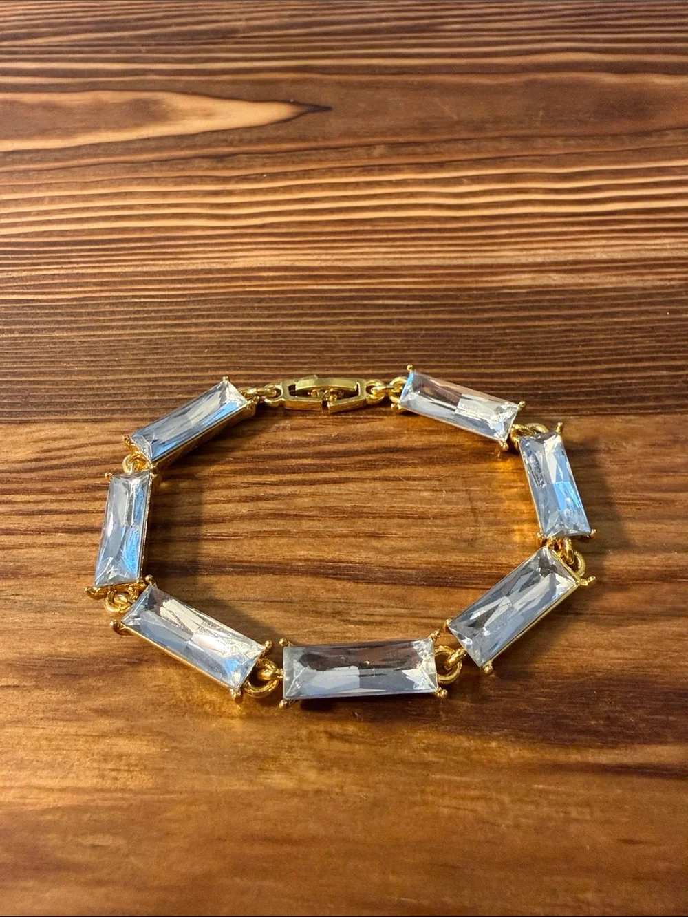 Gold tone with clear Tennis bracelet wiith baguette-cut stones